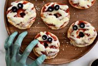 Mini Bagel Mummy Pizzas
Spooky Bagel Bites