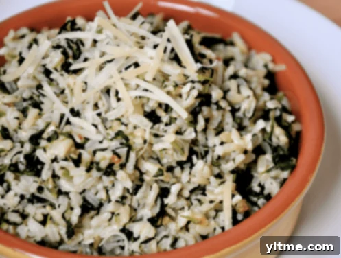 Parmesan Rice with Spinach, a healthy and delicious side dish with brown rice, garlic, and Parmesan cheese.