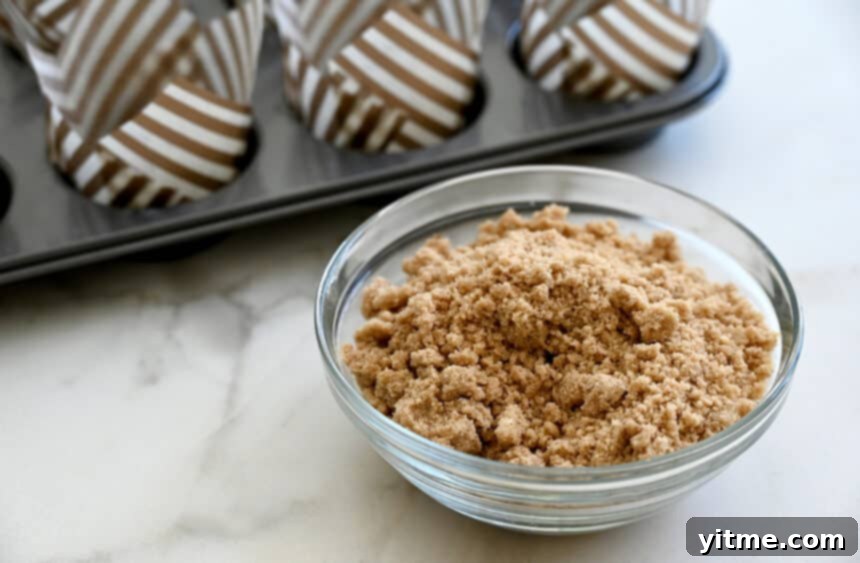 A small clear bowl containing streusel