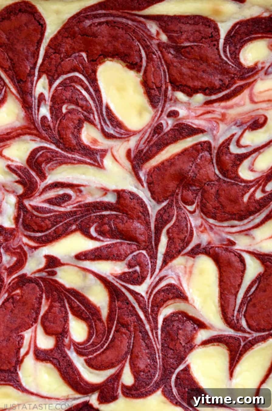 Close-up view of Red Velvet Cheesecake Brownies