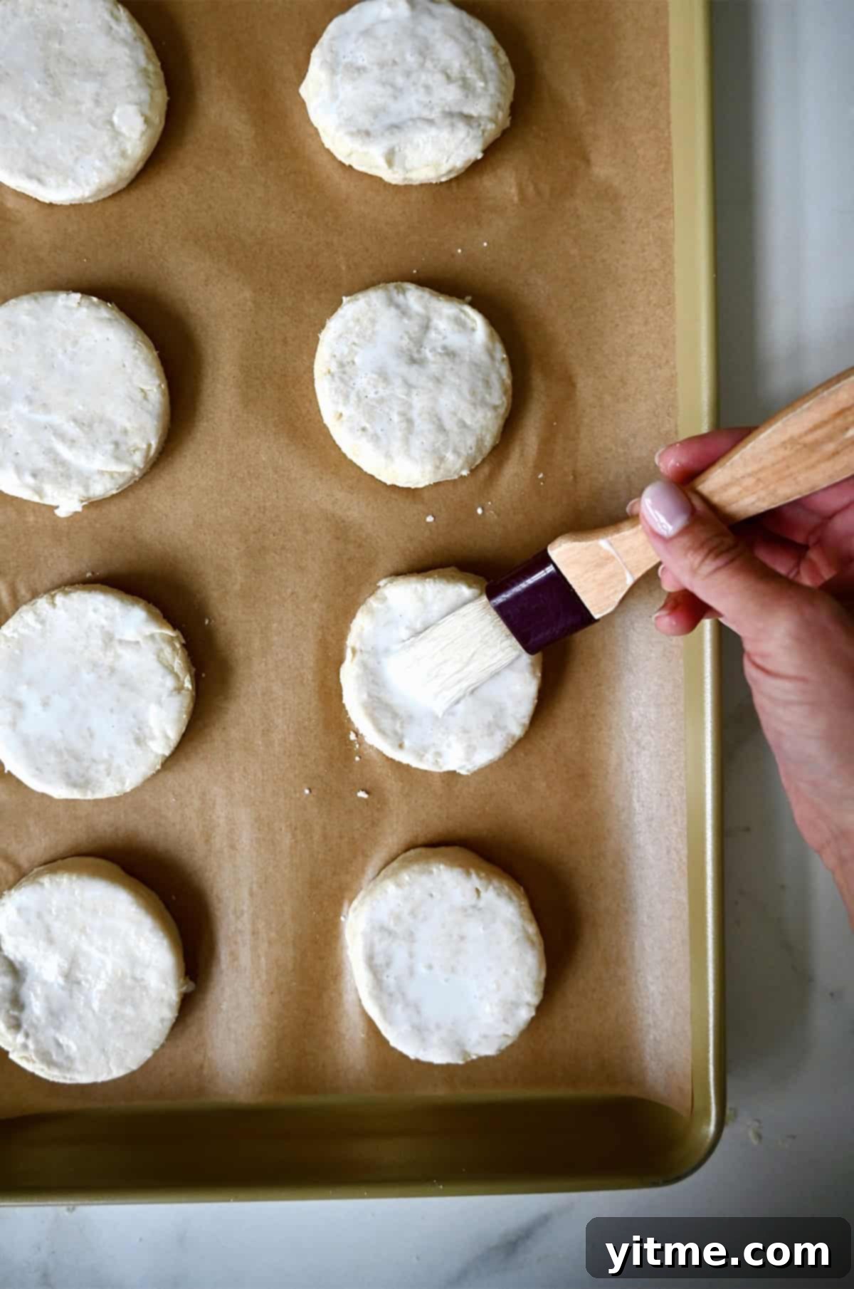 Quick Strawberry Shortcake 8 Brushing the tops of unbaked biscuits with heavy cream.