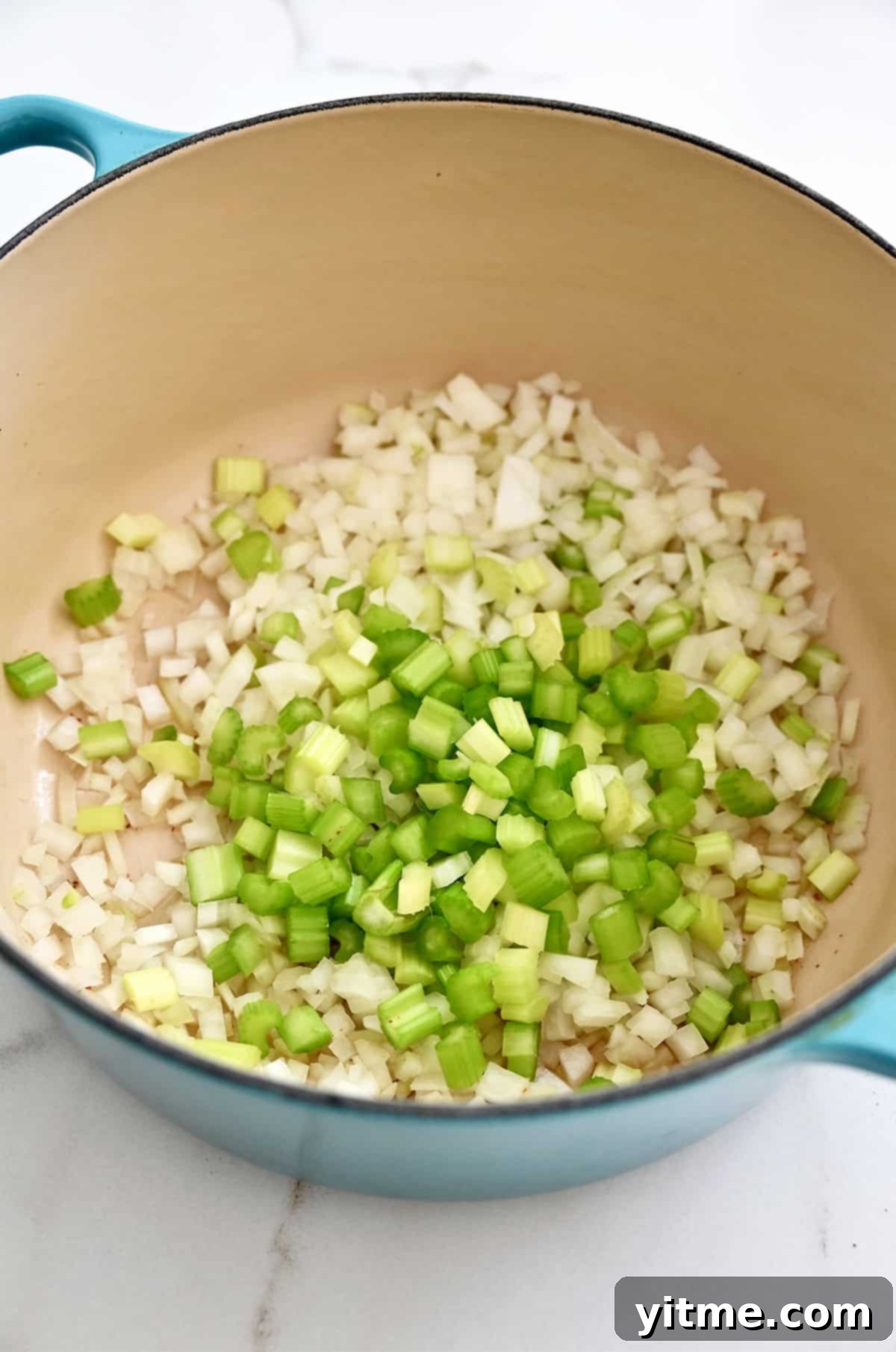 Creamy Potato Soup with Crispy Bacon and Cheddar 5 Sautéing onions and celery in bacon grease.