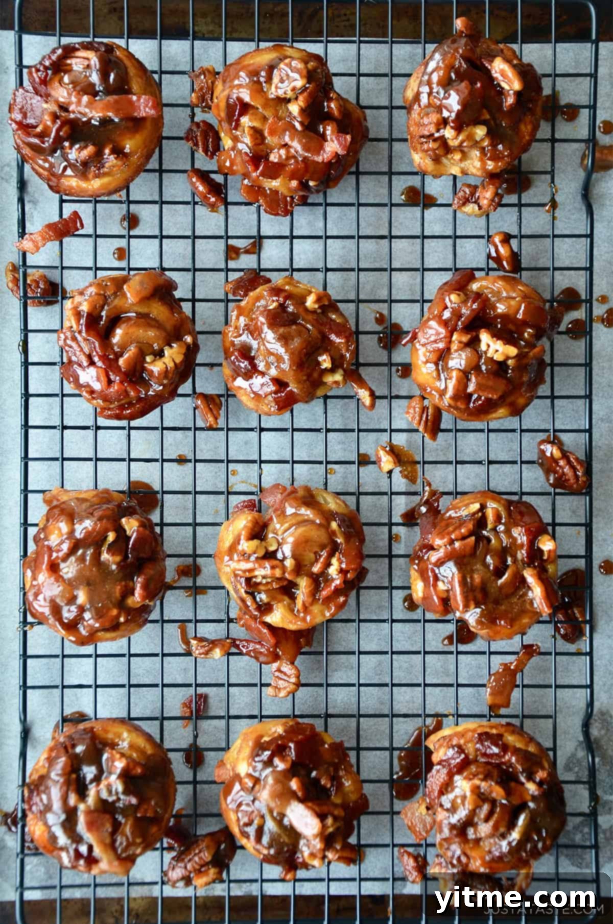 Finished sticky buns on a cooling rack.