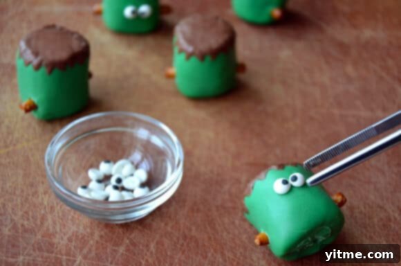 Frankenstein Marshmallow Pops from justataste.com #halloween