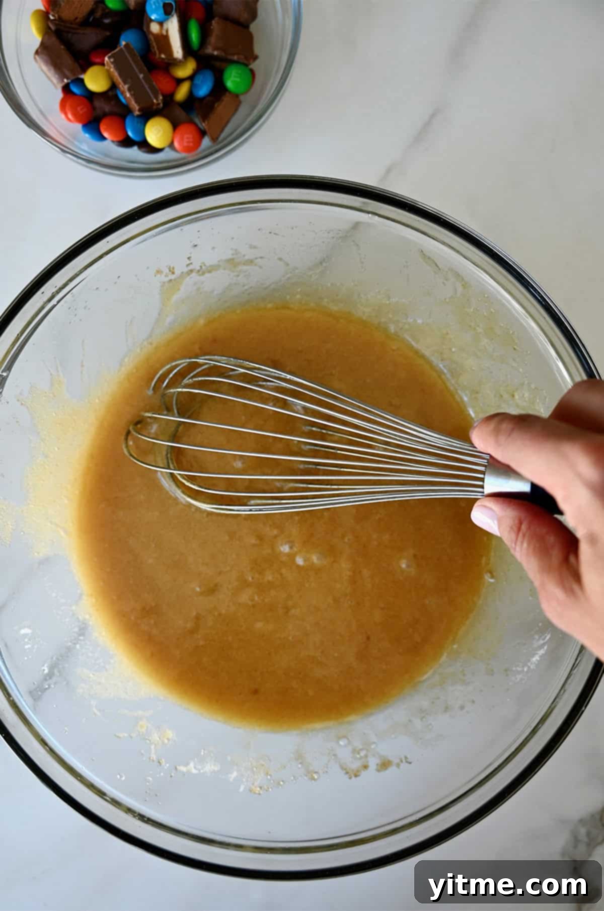 Blondies batter being stirred together.