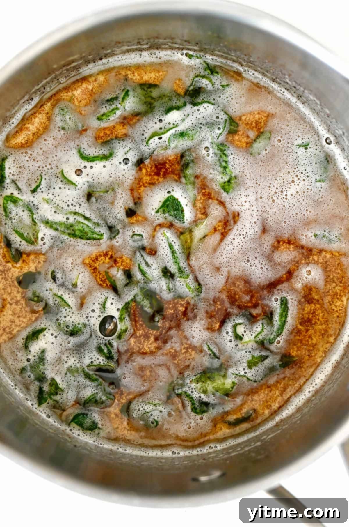 Sweet Potato Gnocchi in Balsamic Brown Butter Sauce 12 Brown butter sage sauce in a skillet.