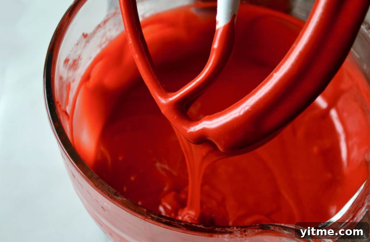Mixing red velvet cake batter