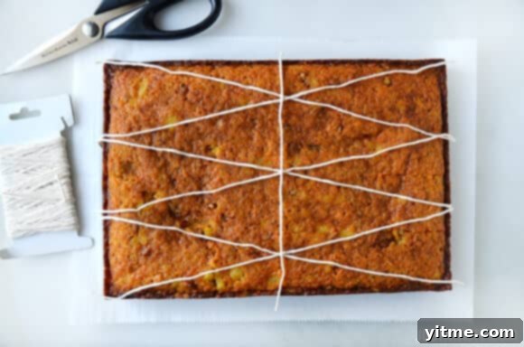 Moist Pineapple Carrot Cake with Cream Cheese Frosting 2 Overhead shot of a 9x13 inch Pineapple Carrot Cake ready for cutting