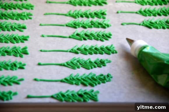Pineapple Carrot Cake with Cream Cheese Frosting #recipe Decorated carrot cake slice with orange candy melt details