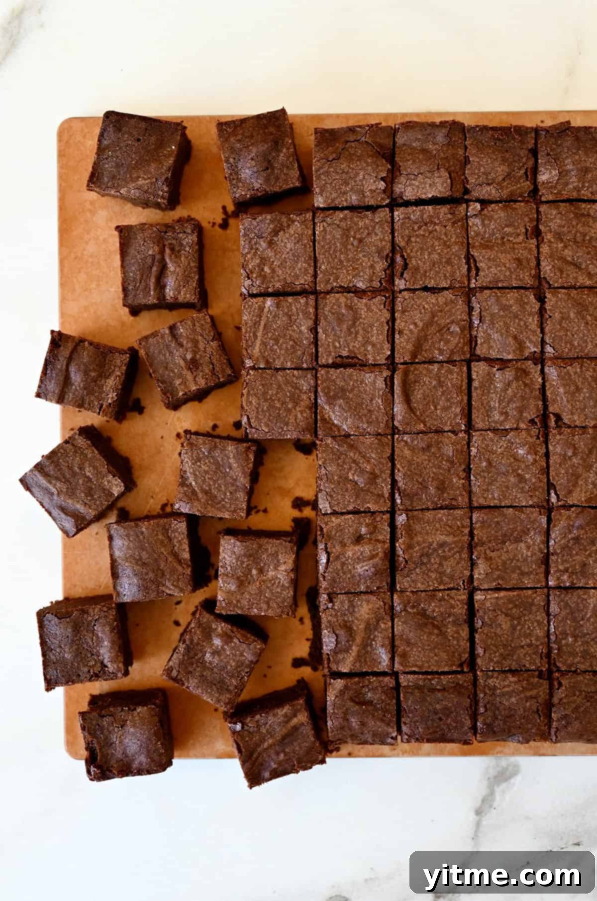 Individual Fruit and Brownie Parfaits 5 Brownie chunks on a cutting board