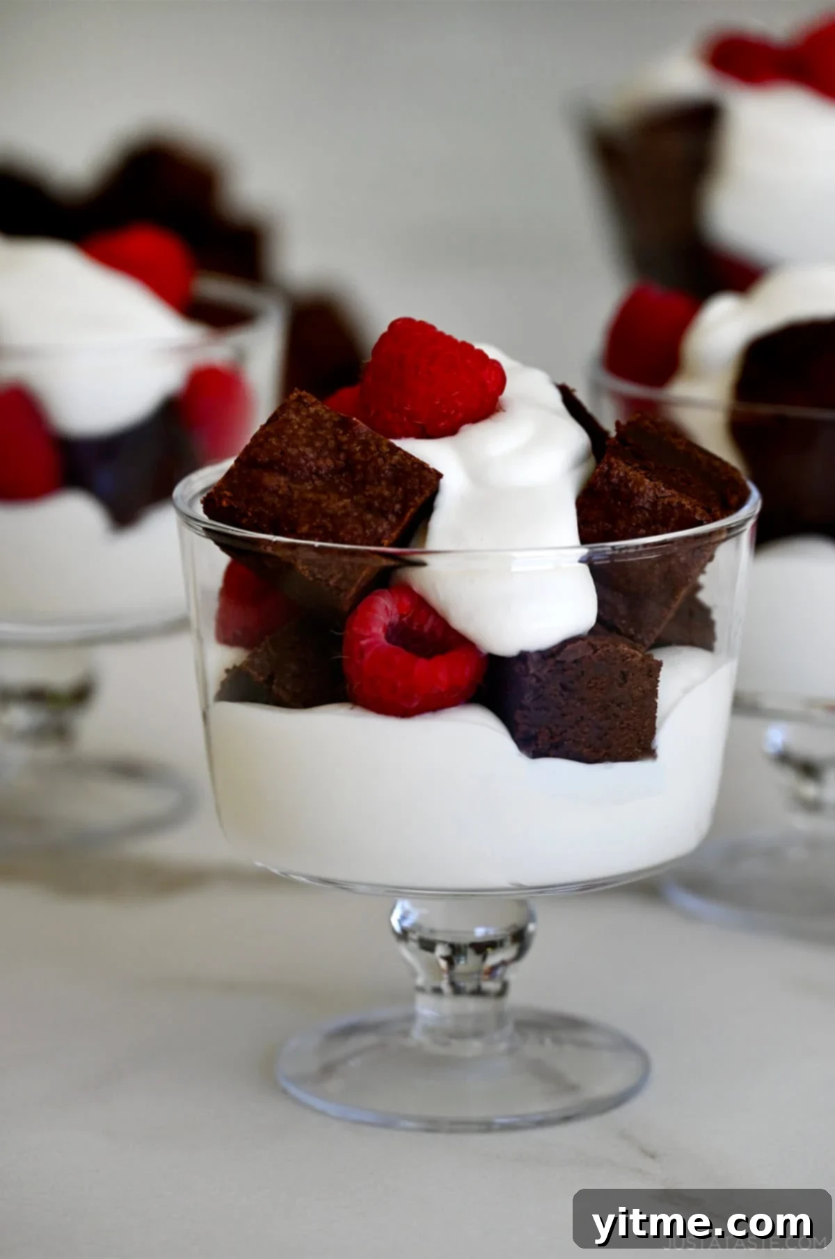 Individual Fruit and Brownie Parfaits 8 Mini brownie trifles with raspberries and whipped cream