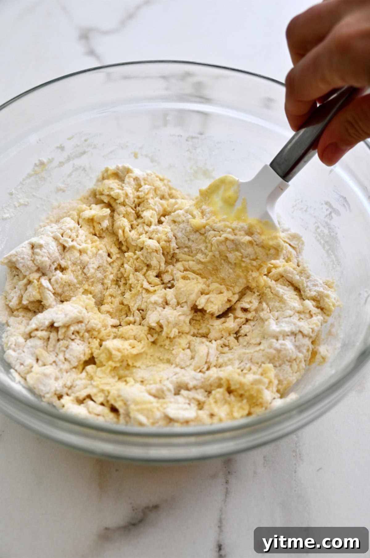 Golden Belgian Waffles From Scratch 6 Combining dry ingredients with the wet waffle ingredients.