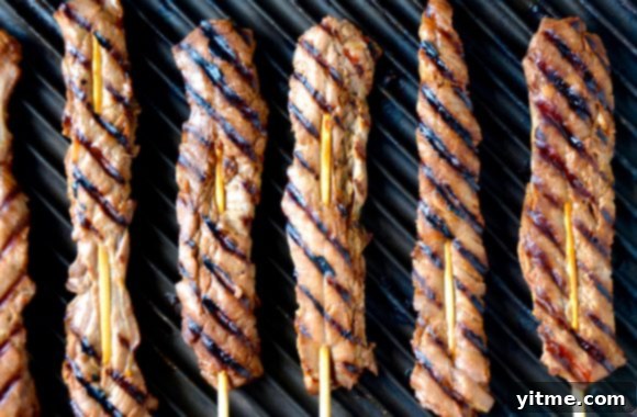 Five-Spice Beef Skewers 4 A grill pan with beef skewers on sticks