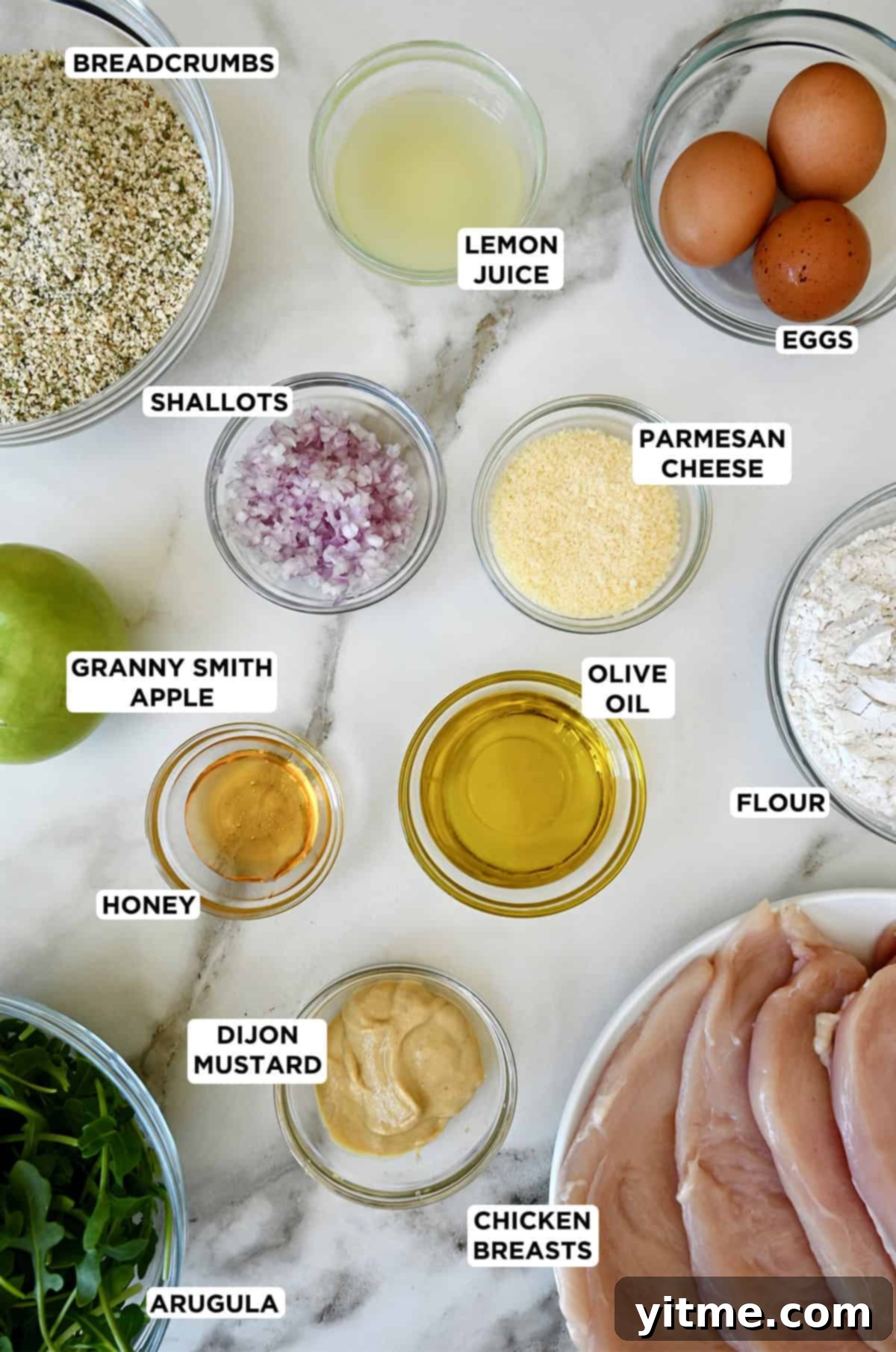 Ingredients for Chicken Milanese in glass bowls