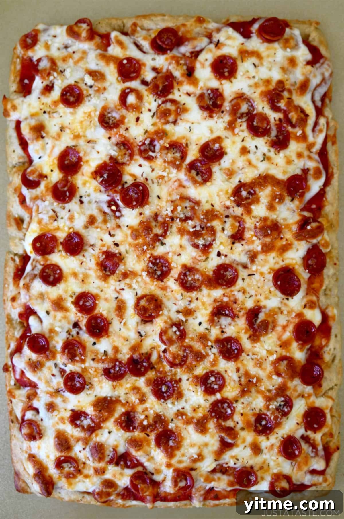 Focaccia bread pizza with mozzarella cheese and mini pepperoni.