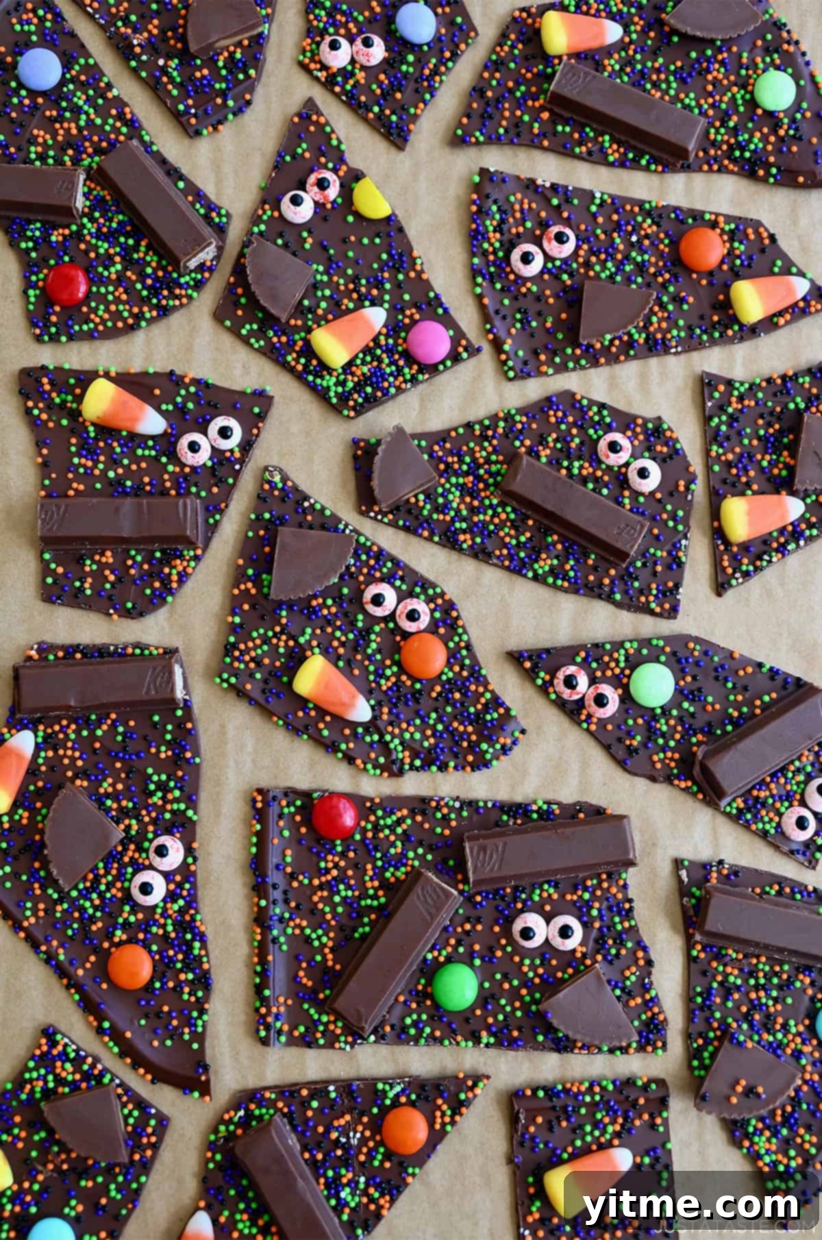 Halloween chocolate bark with leftover Halloween pieces and bloodshot candy eyes.
