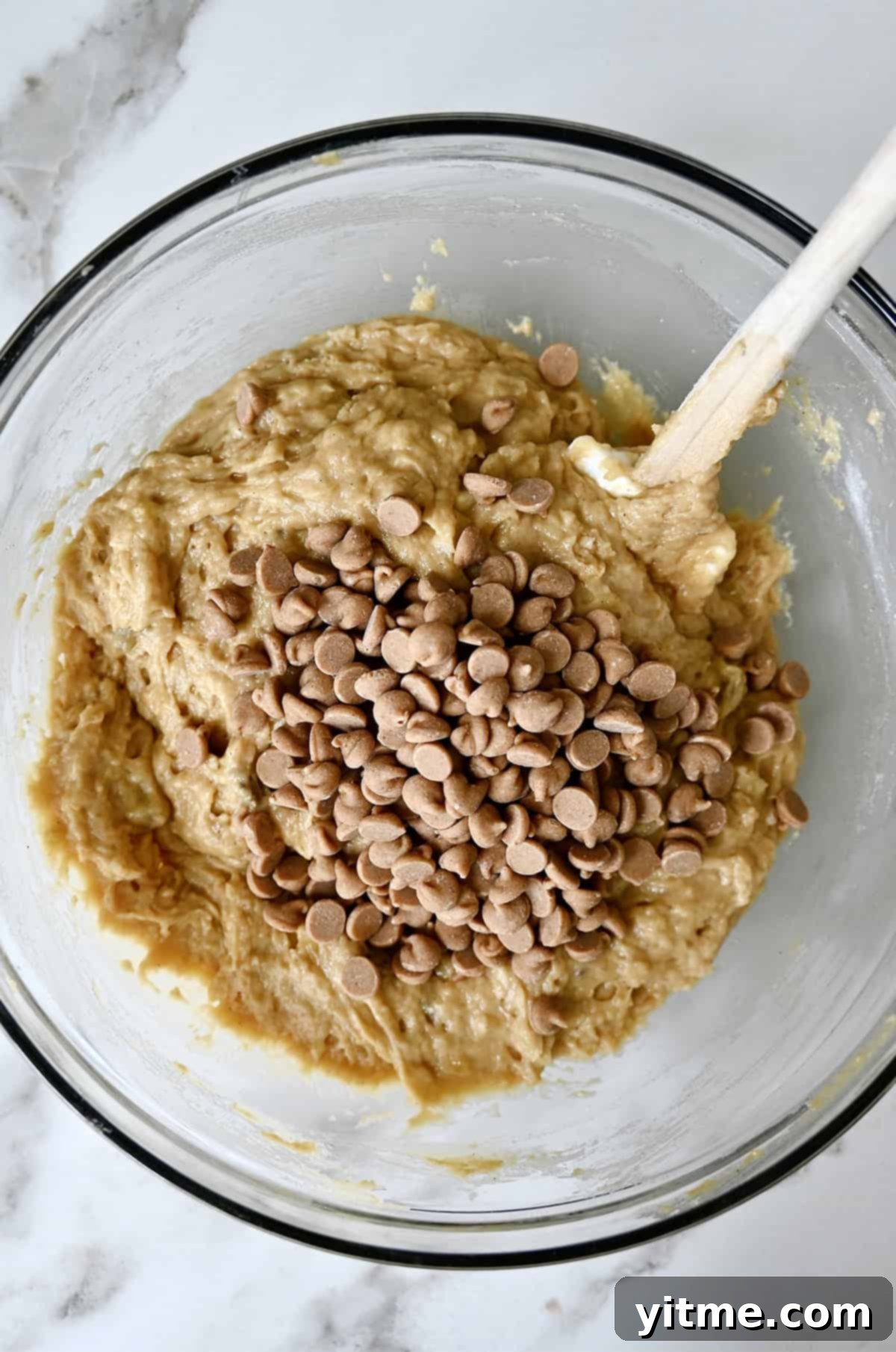 Peanut Butter Banana Bliss Bread 8 Adding peanut butter chips to the batter