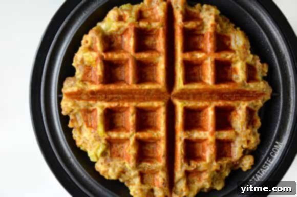 A close-up shot of crispy stuffing waffles on a plate.