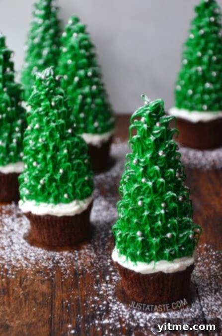Christmas Tree Cupcakes Recipe from justataste.com, a delightful and festive treat.