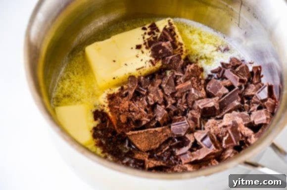 Melted butter and semisweet chocolate in a saucepan