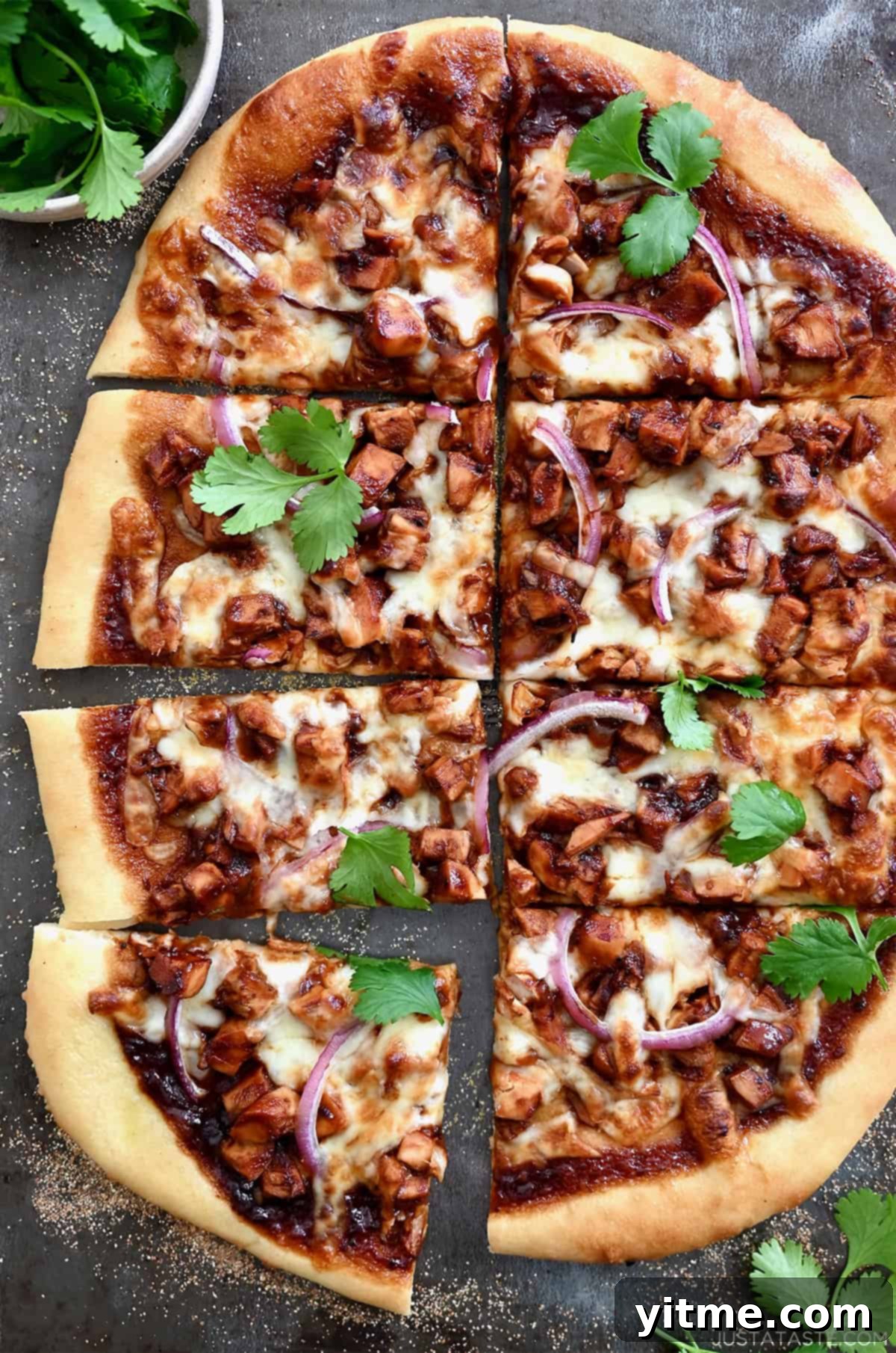 BBQ chicken pizza with red onions and cilantro