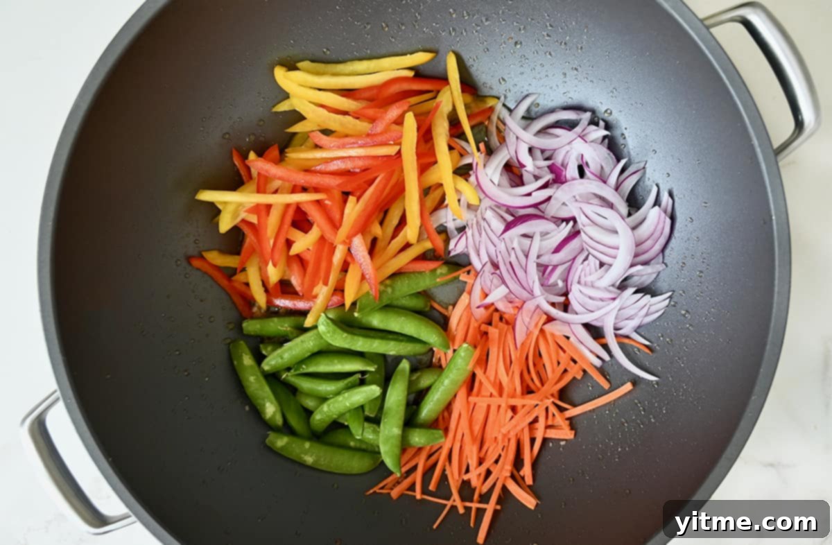 Stir fried vegetables in a wok.
