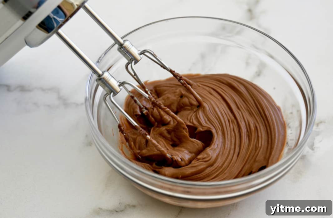 Chocolate Strawberry Bruschetta Bites 3 Whipped Nutella cream cheese in a clear bowl