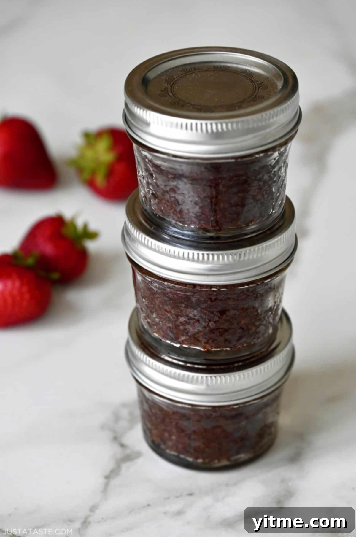 Brownies in jars stacked three high.