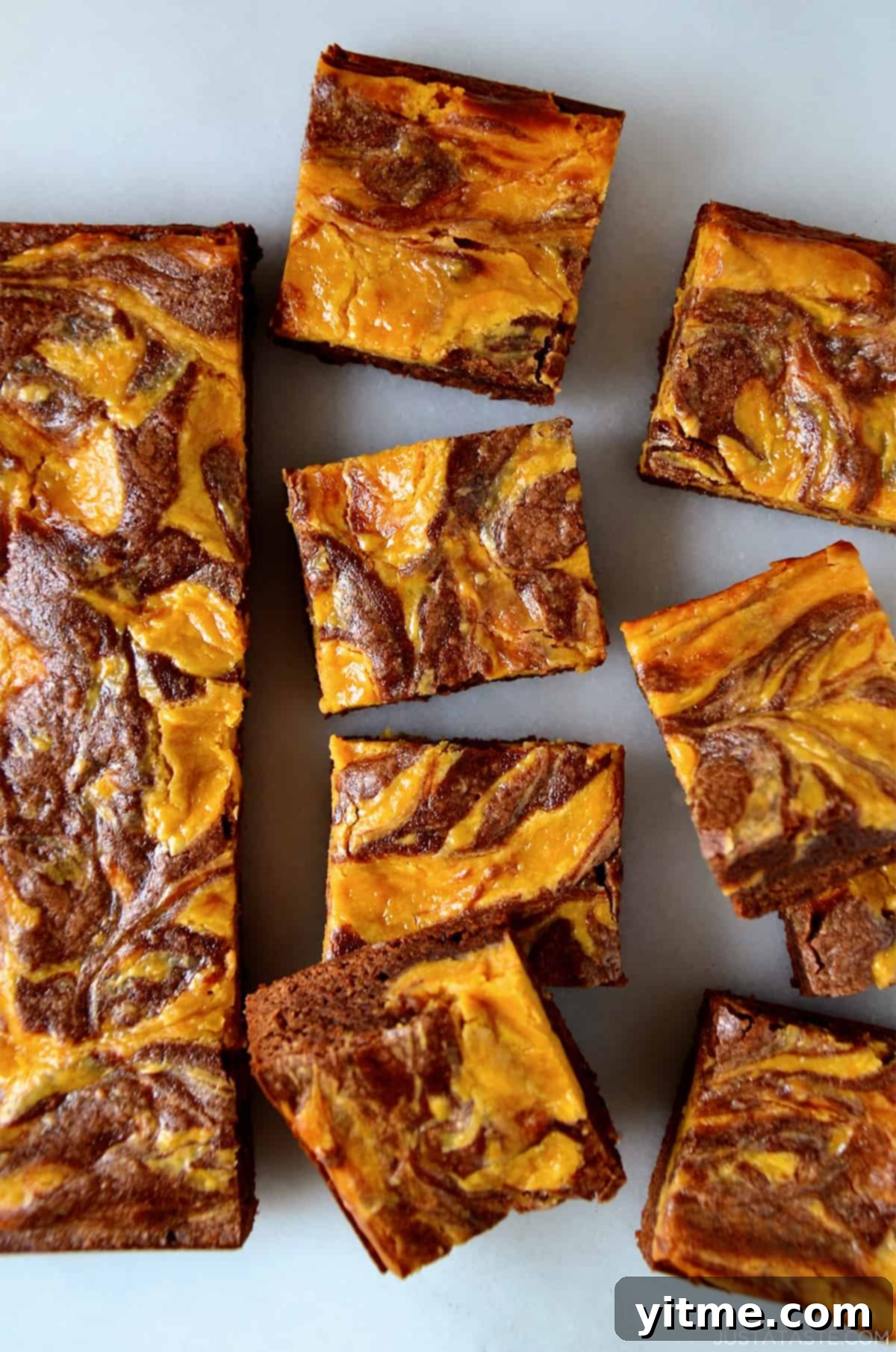 Fudgy brownies swirled with butterscotch cheesecake cut into perfect squares.