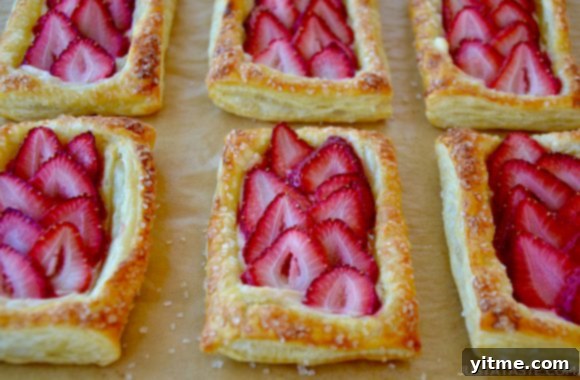 Homemade 5-Ingredient Strawberry Breakfast Pastries on parchment paper