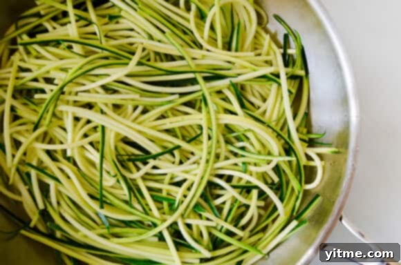 Zucchini Noodles with Sun-Dried Tomato Pesto recipe on justataste.com