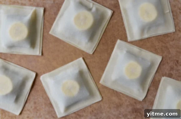 A batch of freshly fried Banana Chocolate Wonton Poppers