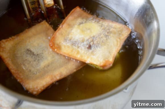 Banana Chocolate Wonton Poppers ready to be dipped in caramel sauce