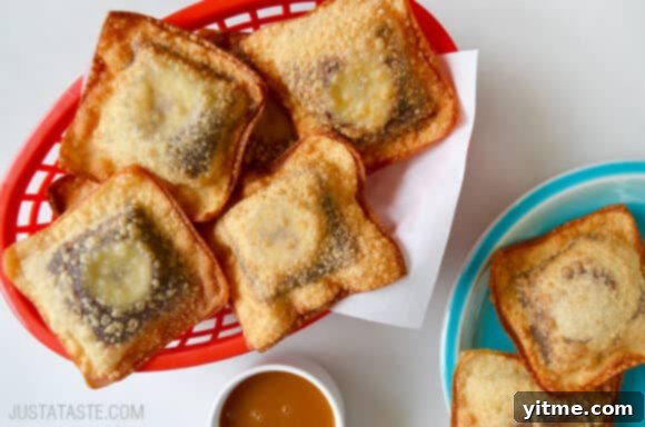 Delicious Banana Chocolate Wonton Poppers dipped in caramel sauce