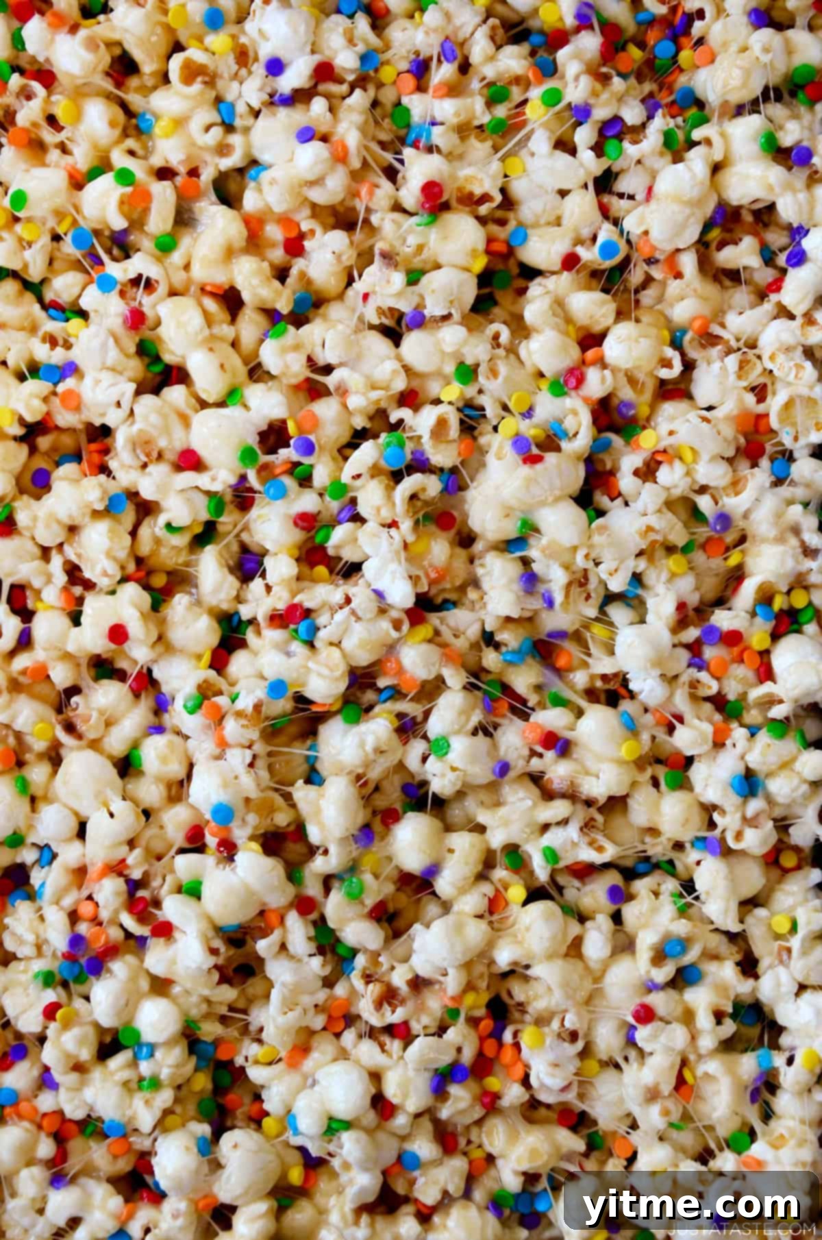 Marshmallow popcorn with rainbow sprinkles.
