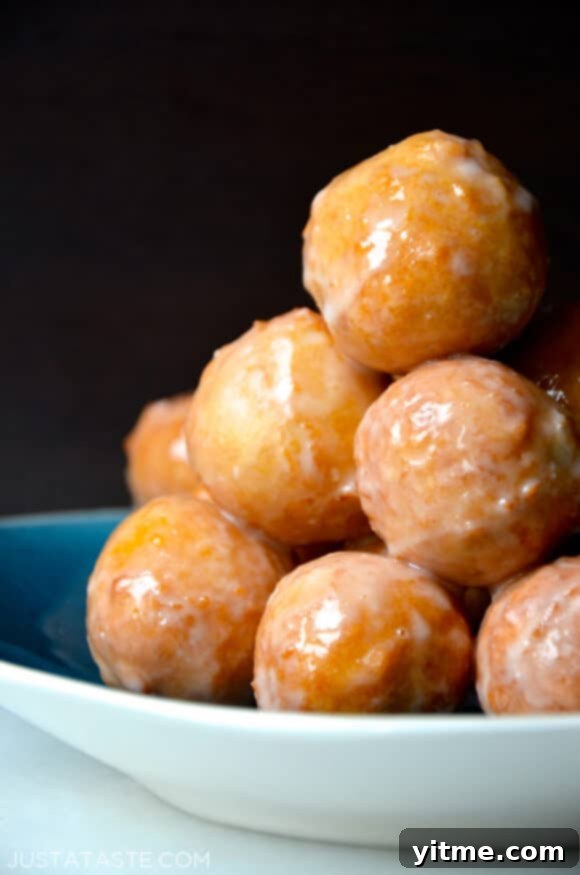 A stack of homemade doughnut holes.