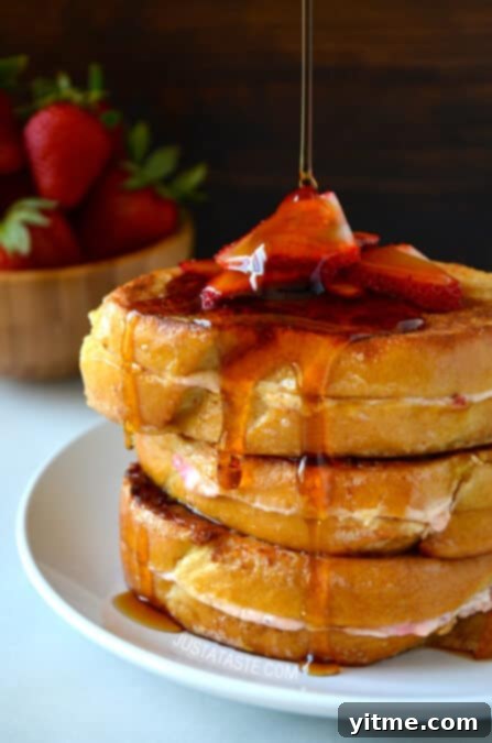 Strawberry Cheesecake Stuffed French Toast recipe on justataste.com