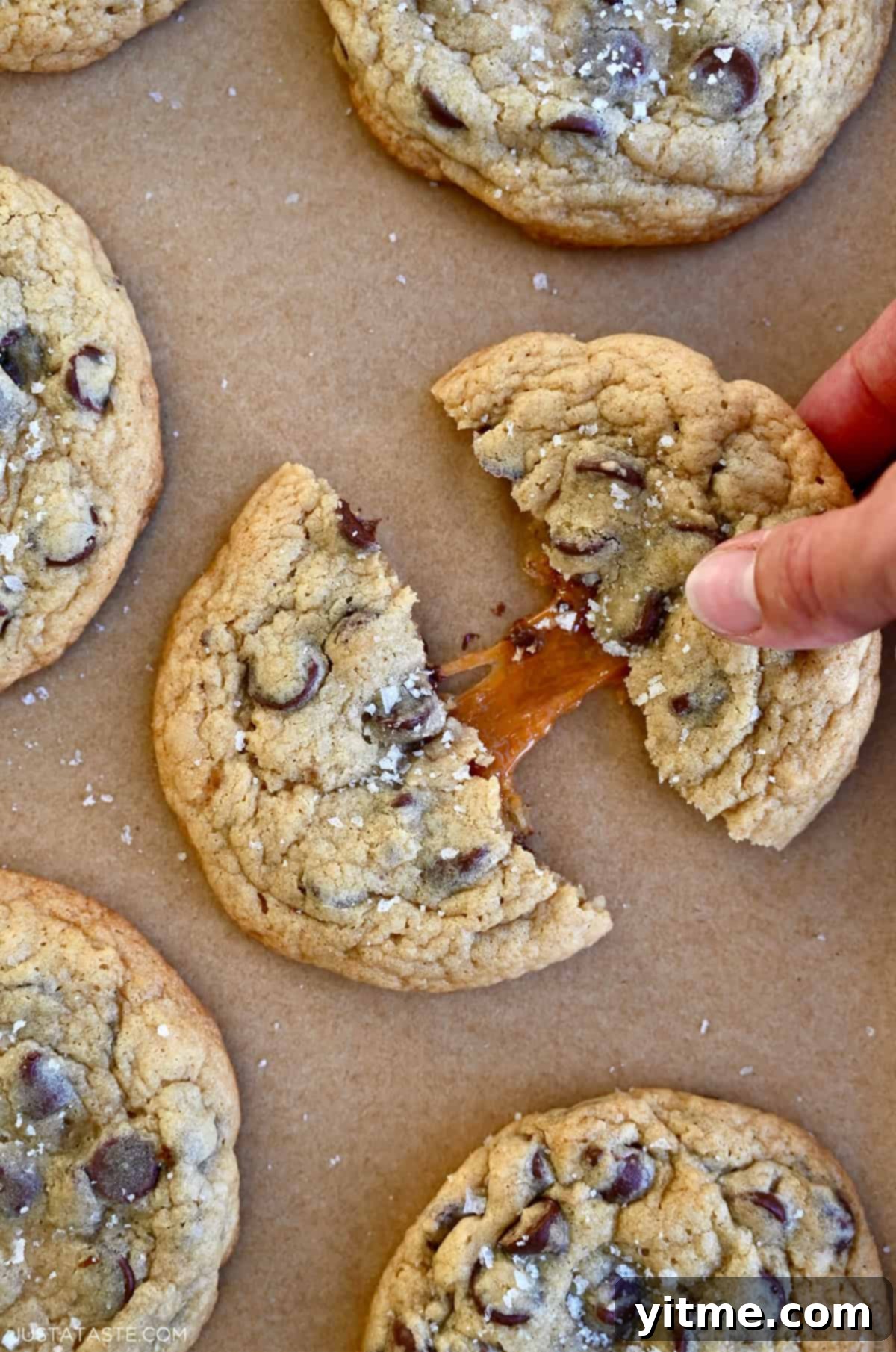 Caramel Lava Chocolate Chip Cookies 2 Caramel-stuffed chocolate chip cookies topped with flaky sea salt.
