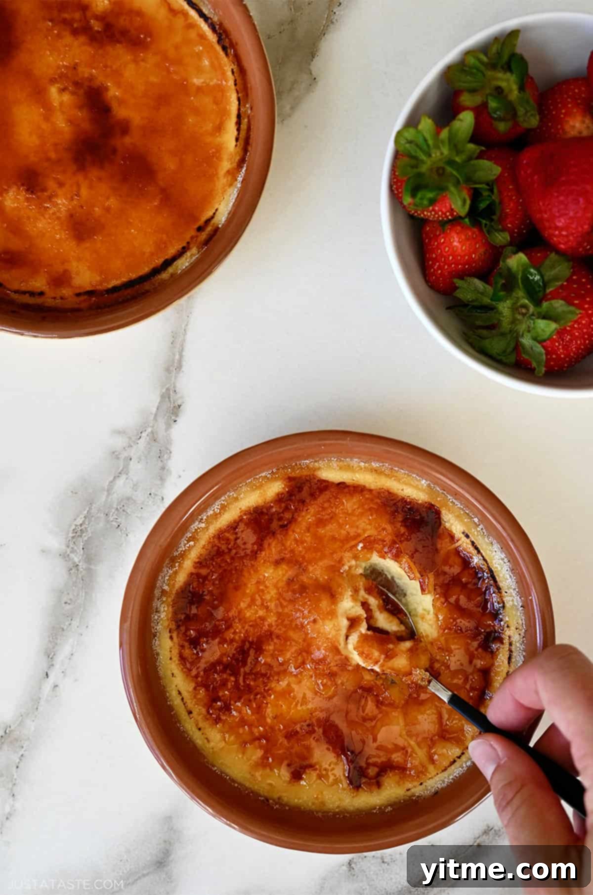 Creamy Crème Brûlée Cheesecake with a burnt sugar topping.