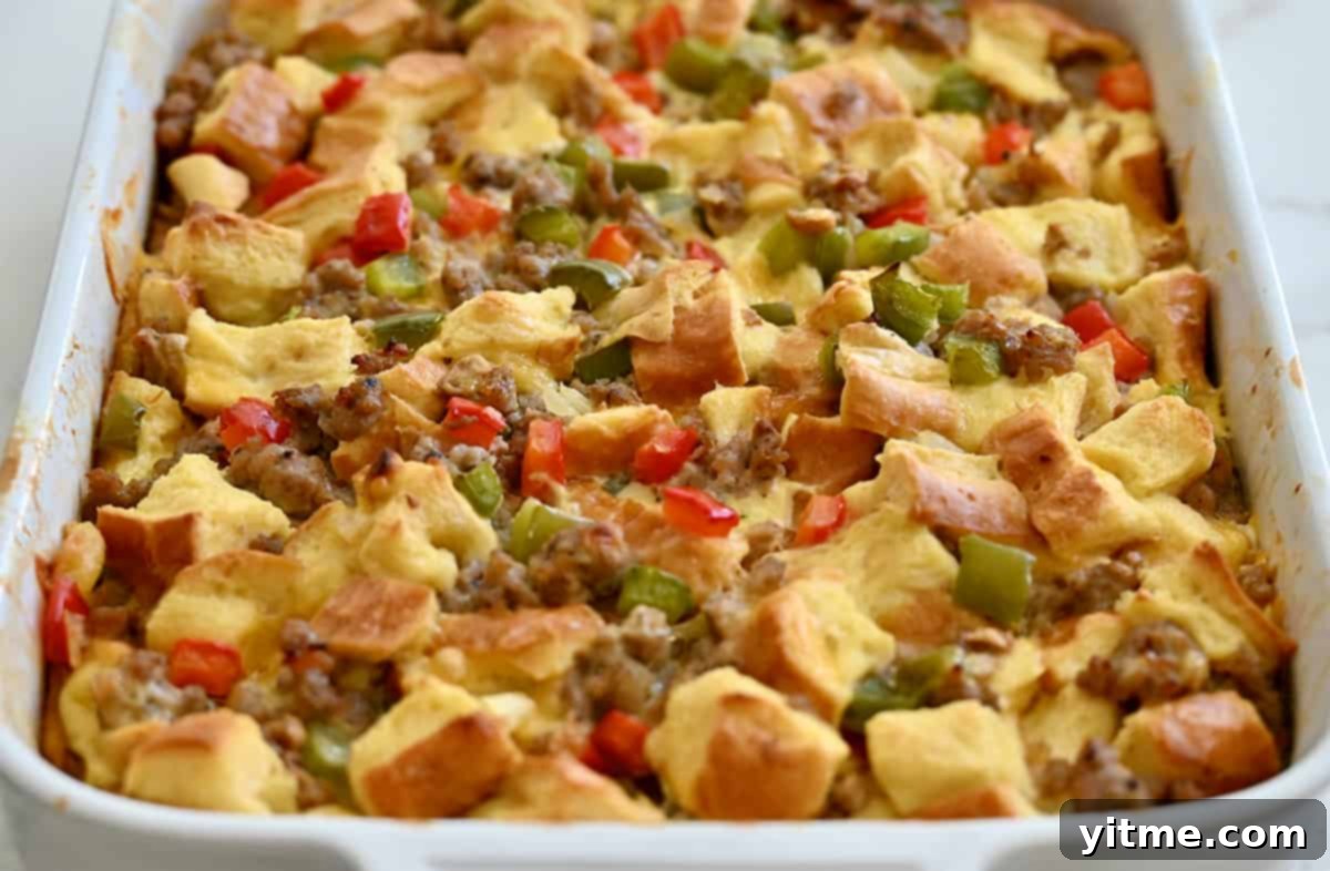 Sausage Sunrise Strata 5 Baked breakfast casserole with bread and cheddar cheese