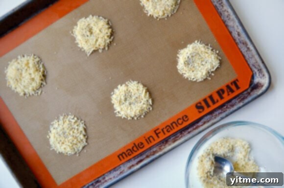 A plate of freshly baked Everything Parmesan Cheese Crisps ready to be served.