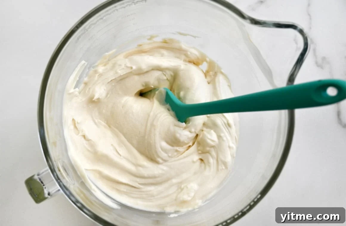 Cream cheese frosting in a bowl