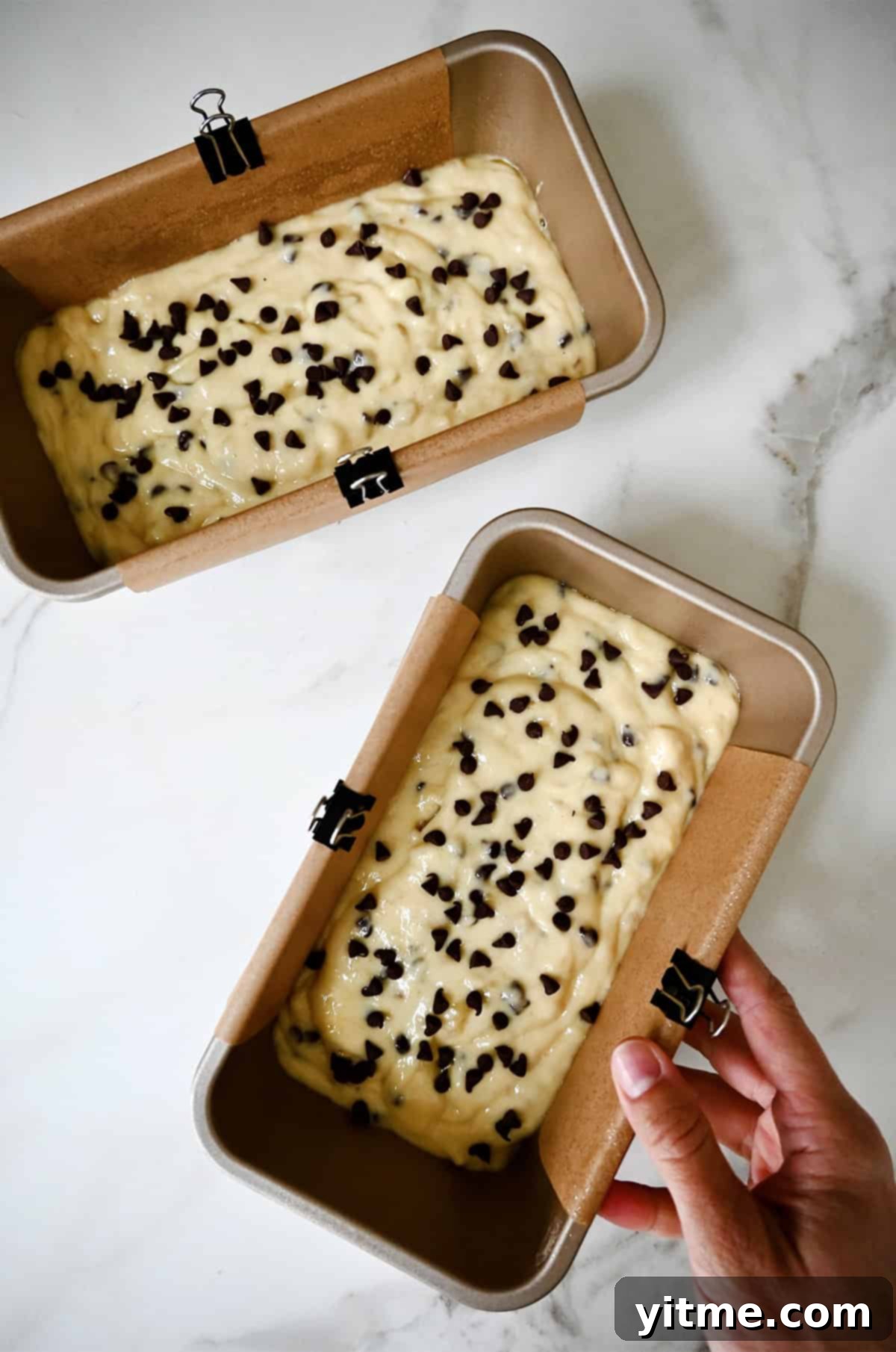 Banana bread batter in loaf pans