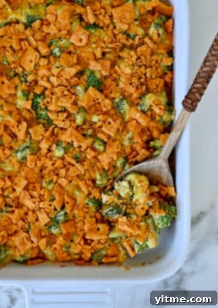 Broccoli cheese casserole topped with cheese crackers.