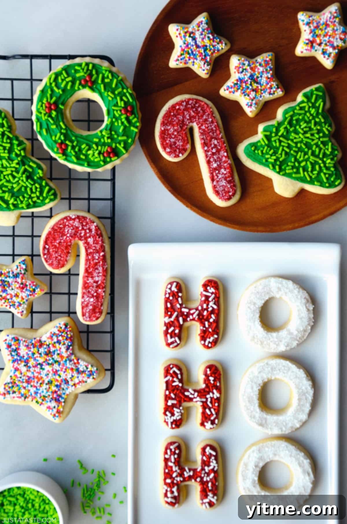 Assorted Christmas cookies on a cooling rack and platter.