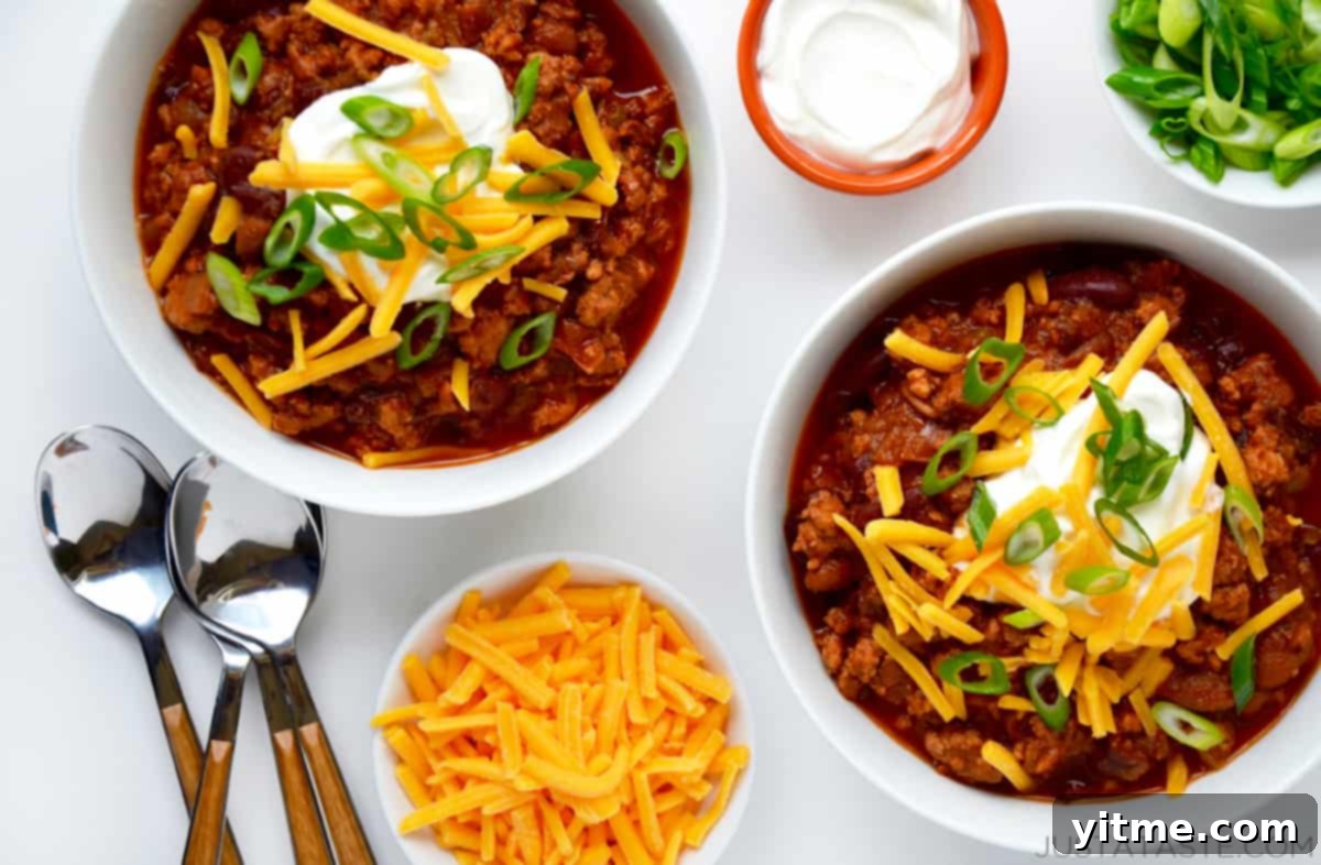 Bowls of chili with toppings