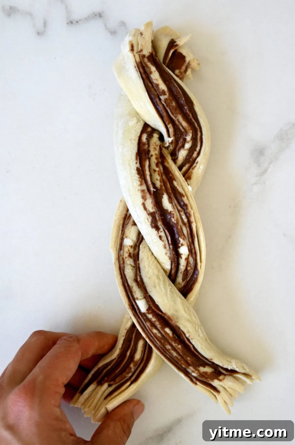 Decadent Chocolate Swirls 8 Unbaked puff pastry braid with chocolate hazelnut spread.