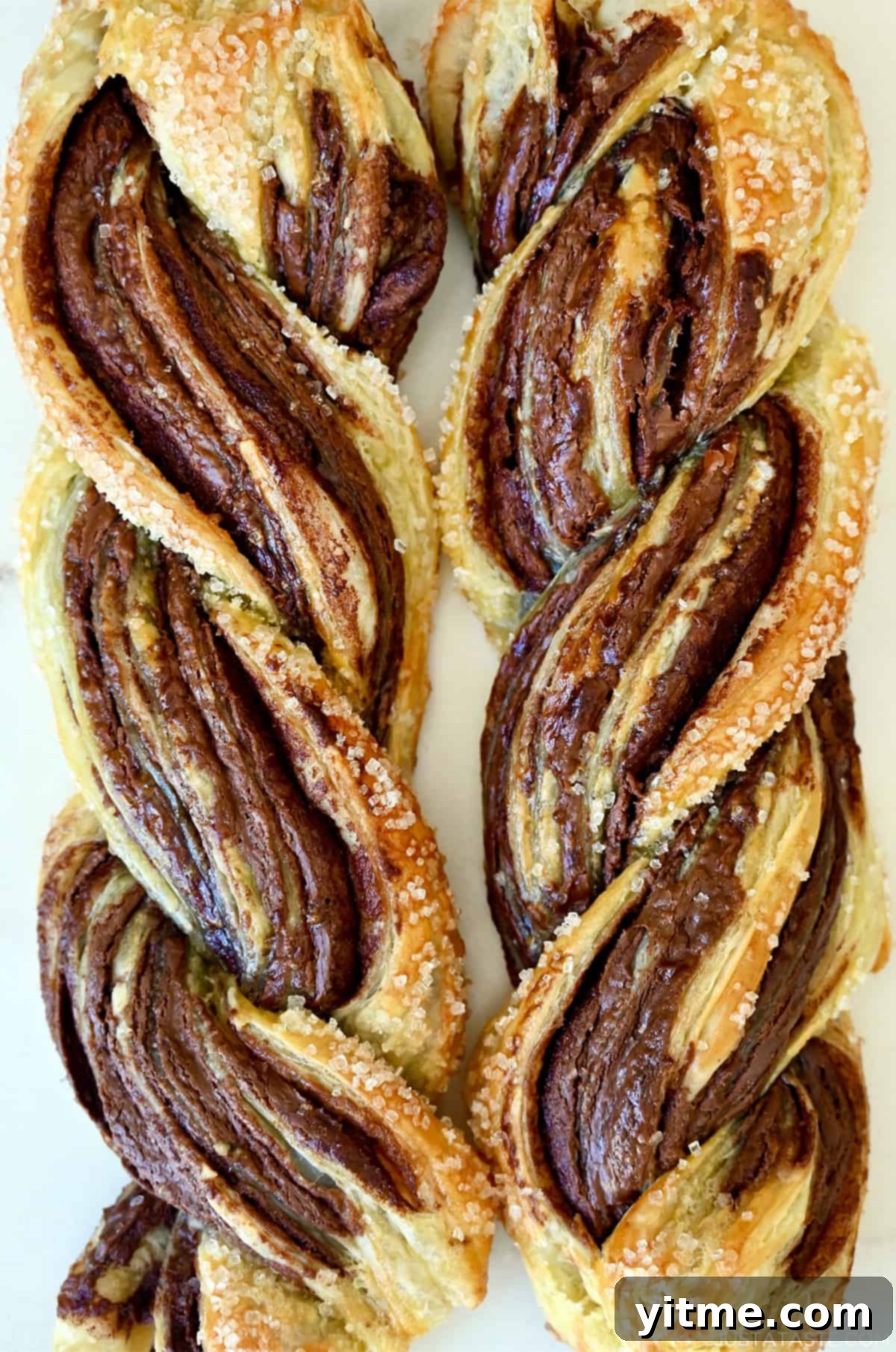 Decadent Chocolate Swirls 10 Chocolate pastry twists with chocolate layers and sanding sugar.