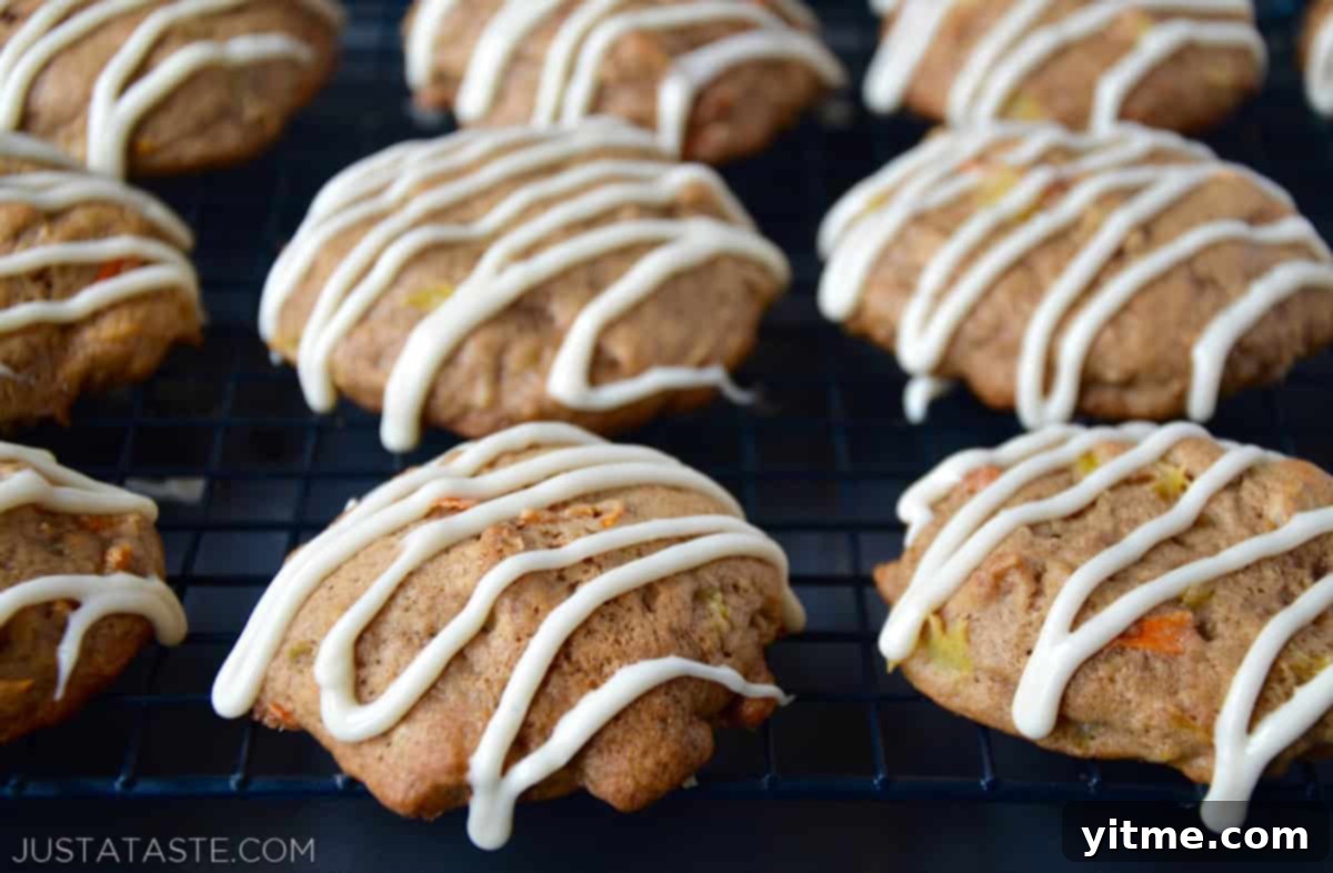 Carrot cake cookies drizzled with cream cheese icing.