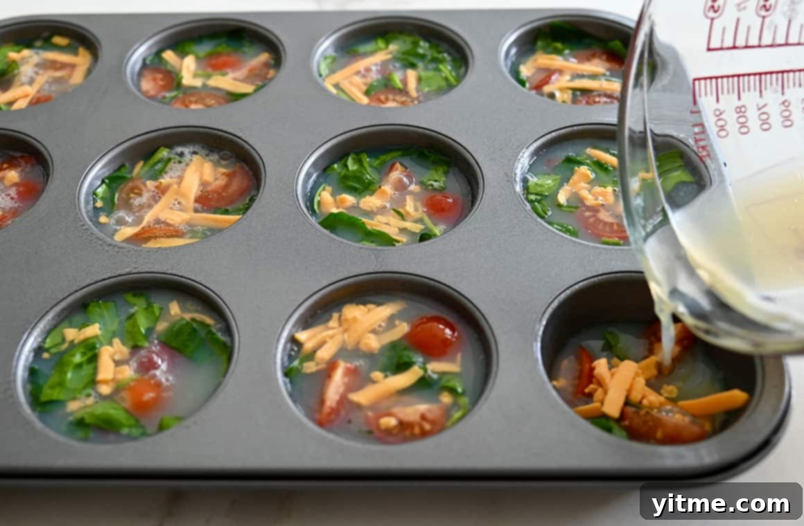 Pouring egg whites into a muffin tin